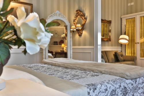 Postel nebo postele na pokoji v ubytování Villa Le Fontanelle