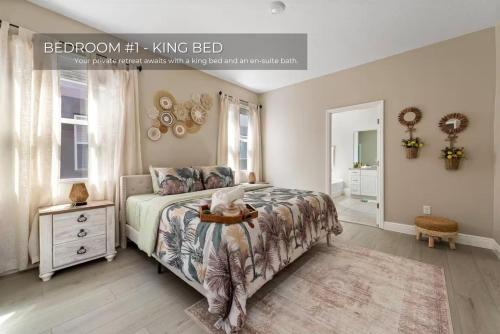 a bedroom with a bed with a nightstand and a bed sidx sidx sidx sidx at Spacious 5BR 45BA Home w Pool in Davenport