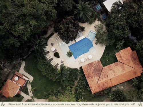 an overhead view of a yard with a swimming pool at Kantawa Refugio de Bienestar in El Zaino