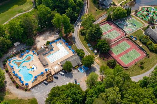 an overhead view of a pool and a park at Rumbling Bald Resort Unit 2004 in Lake Lure