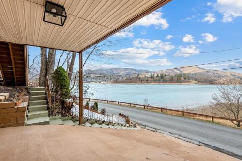 a house with a view of a lake at Lower Lakeshore Living in Lake Junaluska