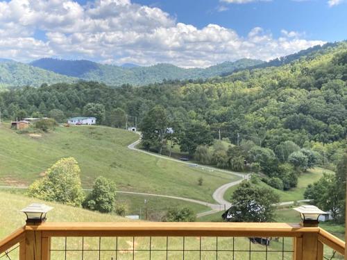a view of a winding road in the mountains at Deimos Cabin in Mars Hill