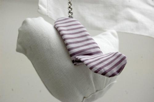 a tie hanging on a chain on a white shirt at Villa Giuanne in Arenzano
