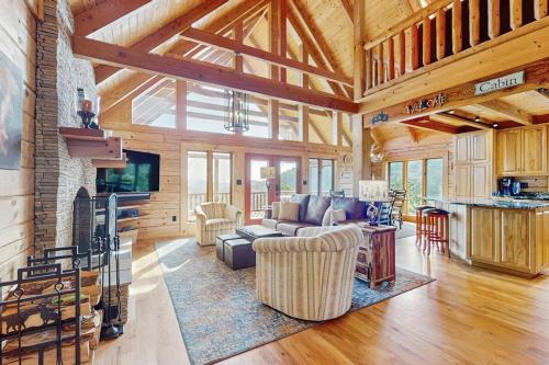 a living room with a couch and a fireplace at Slice of the Mountain in Franklin