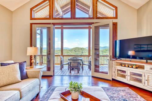 a living room with a couch and a television at Altitude with Gratitude in Whittier
