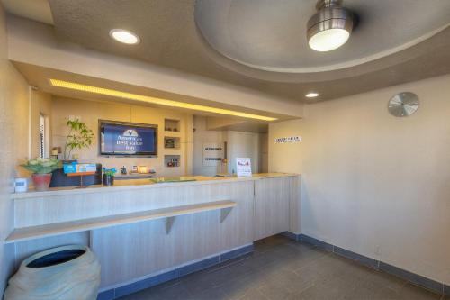 a waiting room with a counter in a clinic at Americas Best Value Inn Amarillo Airport/Grand Street in Amarillo