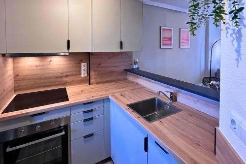 Apartment with panoramic views a swimming pool and a nearby beach