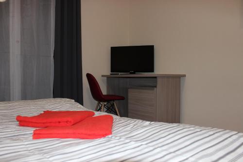 Postel nebo postele na pokoji v ubytování dask resort