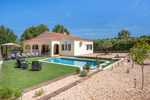 a house with a swimming pool in a yard at SolParc 589 by 3VILLAS in Son Parc
