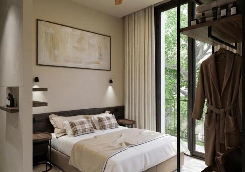 a bedroom with a bed and a large window at Nommadas Cotty - Only Adults in Denia