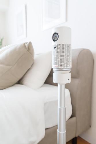 a microphone on a pole in front of a couch at Miroku Nagoya in Minami-sotoborichō