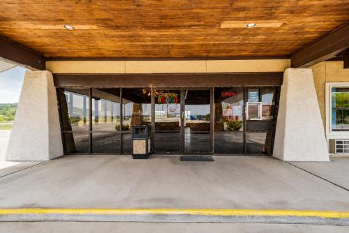 an entrance to a building with glass doors at Segovia Lodge Junction TX I -10 in Junction
