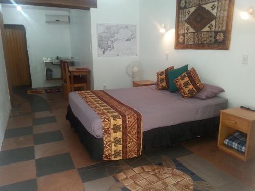 Postel nebo postele na pokoji v ubytování Gecko Lodge Fiji