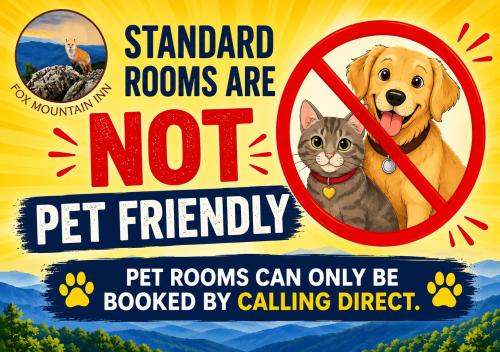 a sign with a dog and a cat at Fox Mountain Inn in Max Meadows