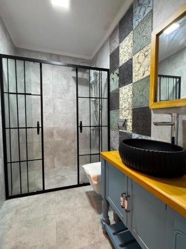 a bathroom with a tire sitting on a counter at Olea Alacati in Çeşme