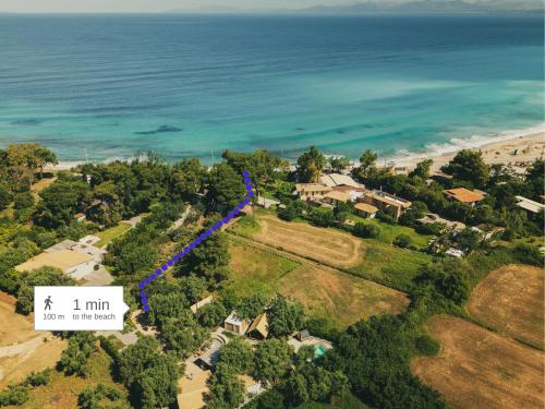an aerial view of a home with the ocean at My Secret Mojo, Private Luxury Retreat Near the Beach in Lefkada