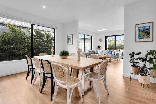 a dining room with a table and chairs at Albert Samian Retreat by Ready Set Stay - BYO sheets and towels in Capel Sound