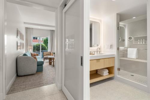 a bathroom with a sink and a mirror at Naples Grande Beach Resort in Naples