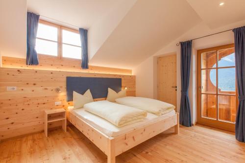 Ένα ή περισσότερα κρεβάτια σε δωμάτιο στο BIO Ranerhof