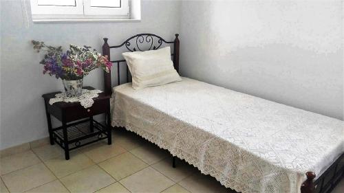 Postel nebo postele na pokoji v ubytování Sea Breeze Apartment