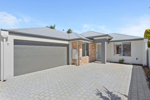 a rendering of a house with a garage at The Tobias in Perth