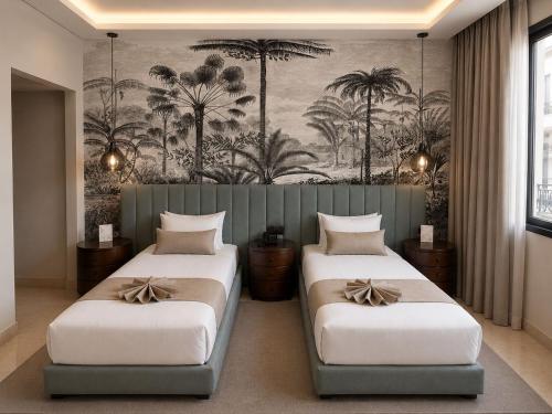 two beds in a room with a mural of palm trees at One Hotel Casablanca in Casablanca