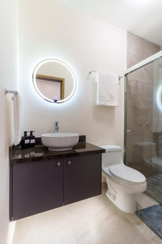O baie la Departamento con WiFi y aire acondicionado Ubicado a 1 min de CAS