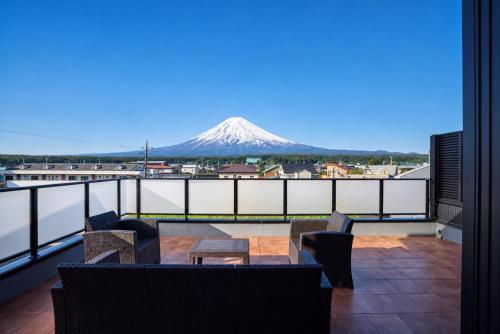 a view of a mt fuji from the balcony of a building at Miire Mt Fuji Traditional in Fujikawaguchiko