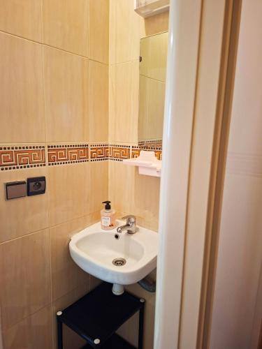 a bathroom with a sink and a mirror at Palm beach in Mansouria in Ben Slimane