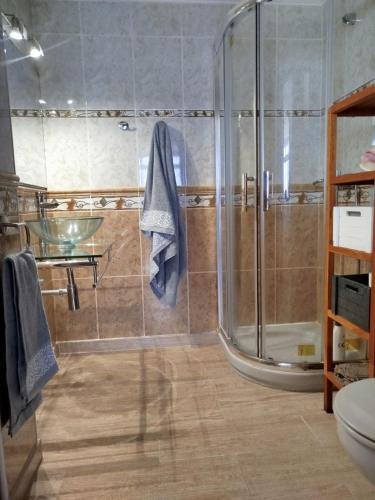 a bathroom with a shower and a sink at Campello Muchavista Beach in El Campello