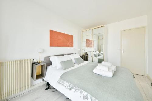 Spacious 2BR Apartment with Eiffel Tower View & Balcony
