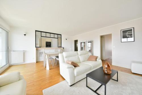 Spacious 2BR Apartment with Eiffel Tower View & Balcony