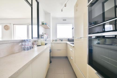 Spacious 2BR Apartment with Eiffel Tower View & Balcony