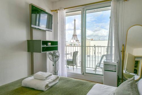 Spacious 2BR Apartment with Eiffel Tower View & Balcony