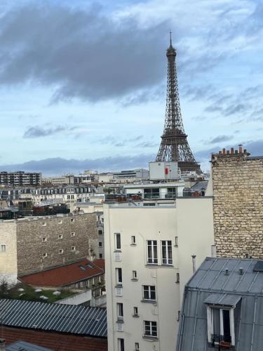 Spacious 2BR Apartment with Eiffel Tower View & Balcony