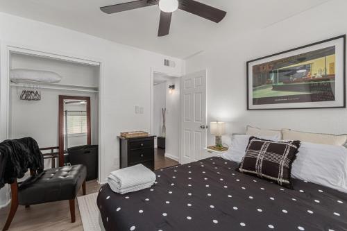 a bedroom with a bed and a ceiling fan at RUDRASAI 2611-Tempe,AZ in Tempe
