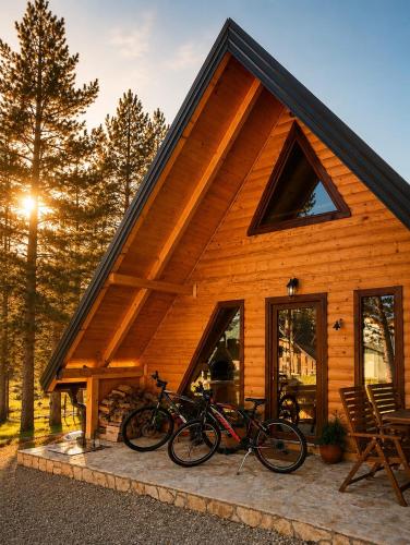 a group of bikes parked outside of a cabin at My Dream - Blidinje in Blidinje