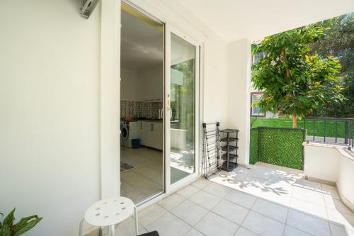 an internal view of a house with sliding glass doors at NEV Fethiye in Fethiye