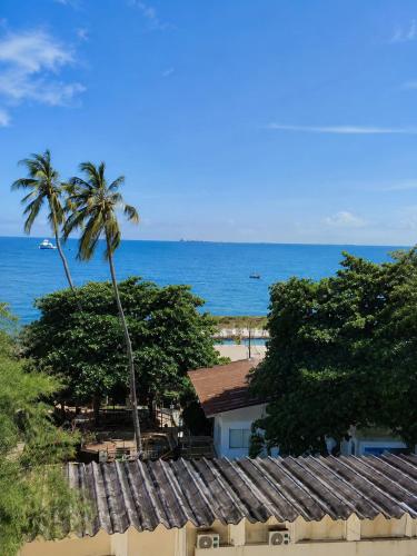 a view of the beach from a resort at TAMA Hotel Santa Marta in Santa Marta