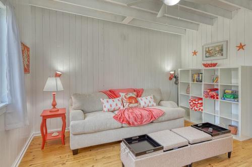 a living room with a couch and a table at The Surfcomber Unit 2 in Ocean Bay Park