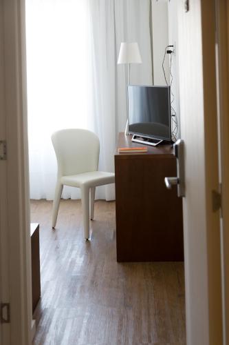 Televisyen dan/atau pusat hiburan di Seaview Hotel Boutique