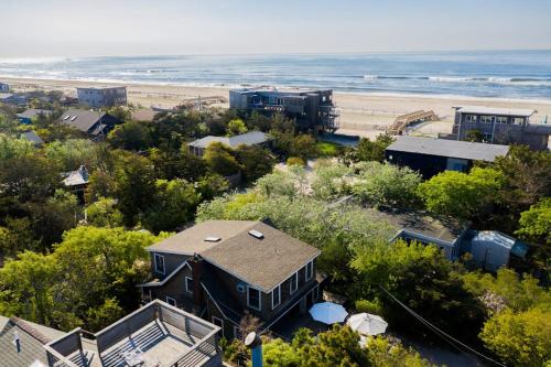 an aerial view of a house and the beach at Seaside Escape on Huron in Ocean Beach