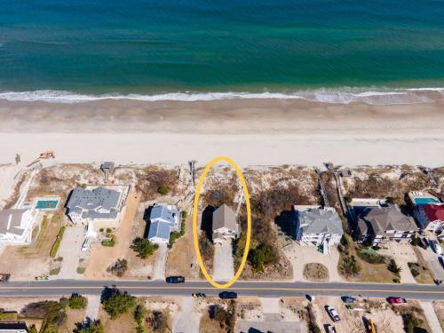 an aerial view of a house on the beach at 1227 - Seven Shells in Corolla