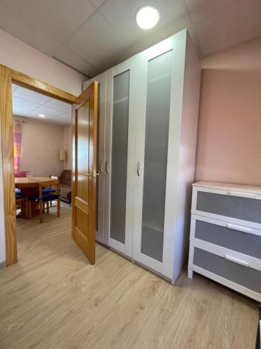 a room with a door and a room with a table at Mi Cielo in Cartagena