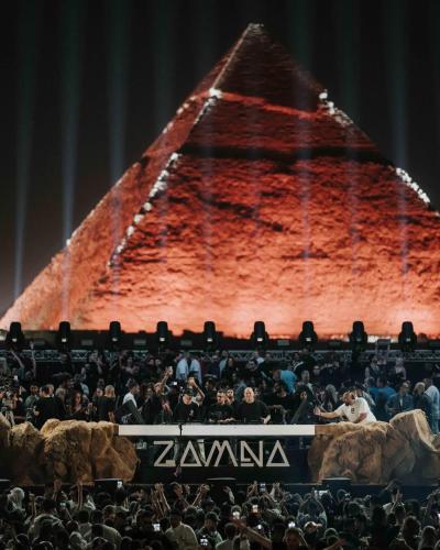 a crowd of people in front of a large stage at Farida Pyramids inn& Jacuzzi in Cairo