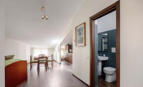 a bathroom with a sink and a toilet in a room at Central Lux - Casa Caracciolo in Castel di Sangro