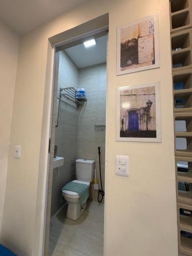 a bathroom with a toilet and a shower at Casa Loft 9C in São Luís