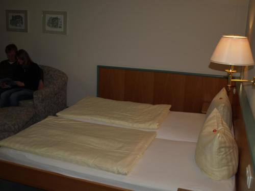 Apparthotel am Friedrichsparkにあるベッド
