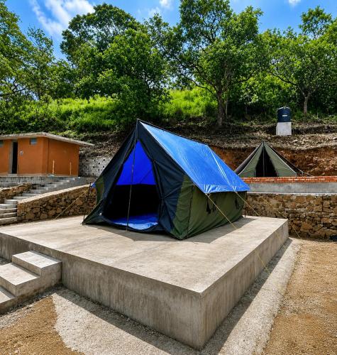 a blue and green tent sitting on the steps at Glamping by CampingLyfe in Bandarawela