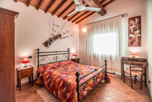 A bed or beds in a room at Agriturismo Spazzavento